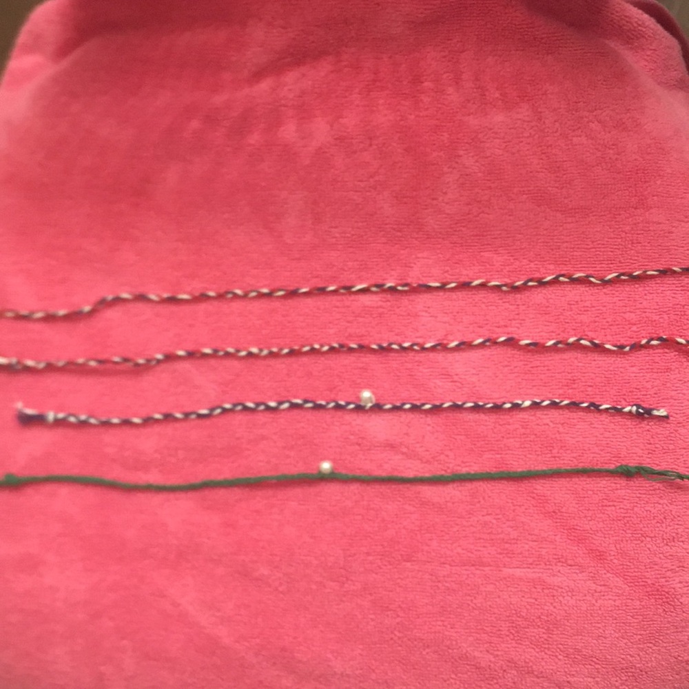 4 bracelets/anklets/chokers